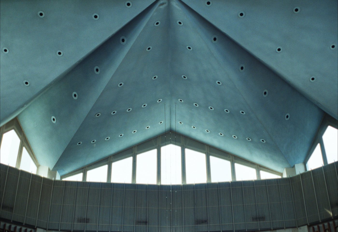 The folded ceiling of a synagogue seen from below.
